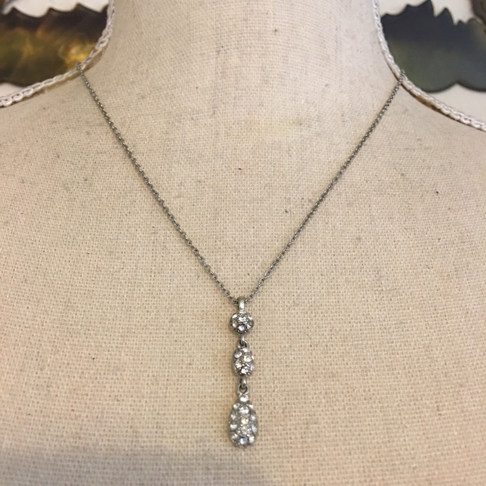 Silver tone rhinestone dangle pendant on chain